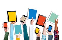 Group of Hands Holding Digital Devices