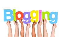 Multi Ethnic People Holding The Word Blogging