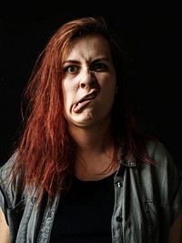 Portrait of a woman with a weird facial expression