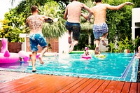 Group of diverse men jumping to the pool