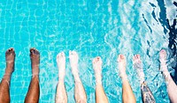 Group of diverse legs in the pool