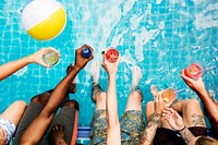 Group of diverse friends enjoying summer time with beverage