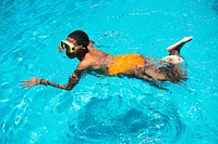 Closeup of african descent woman swim in the pool