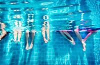 Group of people legs underwater