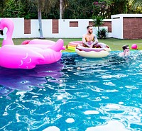 Young adult men and swimming pool