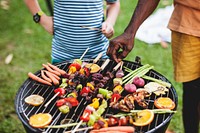 Diverse people enjoying barbecue party together