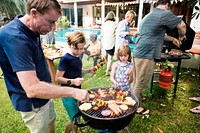 Diverse people enjoying barbecue party together