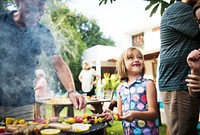 Diverse people enjoying barbecue party together