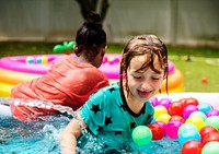Kid playing in a rubber pool