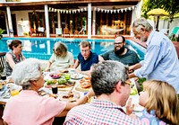 Group of diverse people enjoying barbecue party together