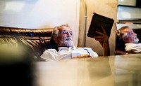 Senior caucasian man using digital tablet