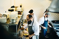 Group of chefs working in the kitchen