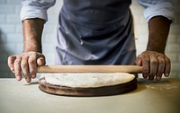 Closeup of hands making dough for bake
