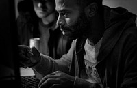 African descent man working with computer laptop