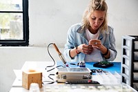 Technician working on computer hard disk