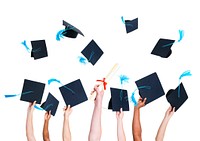 Group of Graduating Student's Hands Holding and Throwing Graduation hats as a Sign of Celebration