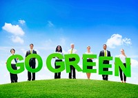 Business People Outdoors Holding Texts Go Green