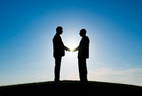 Two Businessmen handshaked for agreement