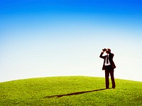 Business man observing nature telescope outdoors Concept