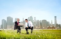 Two Business Men Discussion Documents Outdoors Concept