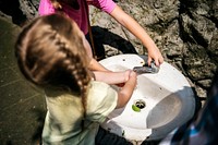 Young girls washing hands at the sink