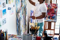 Black artist man doing his art work