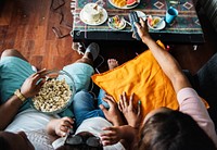 Family eating popcorn