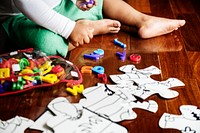 African descent kid enjoying puzzles