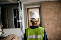 Woman constructor wearing security clothing