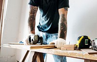 Carpenter working with a wood