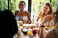 A group of diverse women having breakfast together