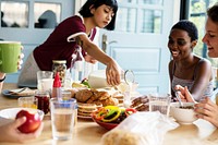 A group of diverse women having breakfast together