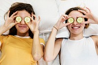 Caucasian women with cucumber eye mask