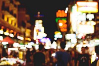 Blurred street market lights at night time