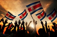 Silhouettes of People Holding Flag of Costa Rica