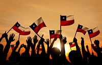 Silhouettes of People Holding Flag of Chile