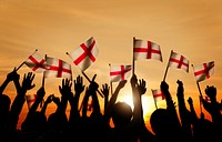Silhouettes of People Holding Flag of England