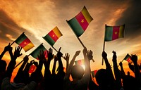 Silhouettes of People Holding Flag of Cameroon