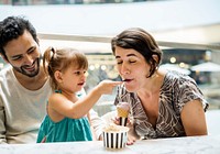Family eating ice-cream together