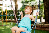 Little girl having fun playing in the park