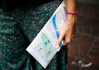 Closeup of hand holding the map