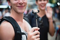 Tourist with scorpion in Bangkok Thailand 