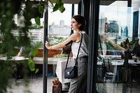 A woman stepping out of the door