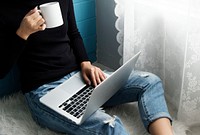 Clsoeup of woman using computer laptop