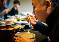 Japanese family dining together with happiness