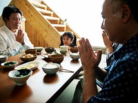 Japanese family dining together with happiness