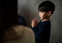 Japanese boy praying