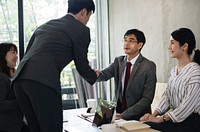 Japanese businessmen having an agreement