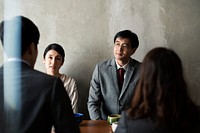 Japanese business people talking