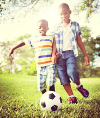 African Children Playing Exercise Football Concept